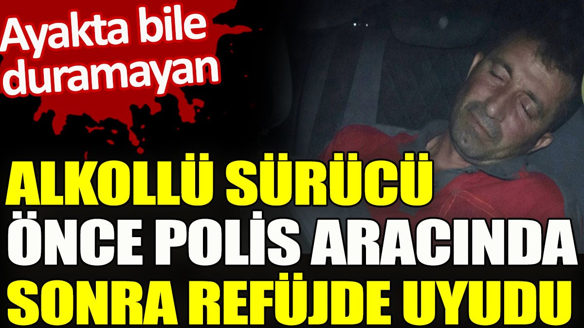 Alkollü sürücü önce polis aracında, sonra refüjde uyudu