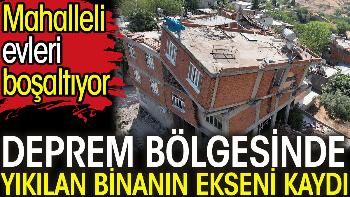 Deprem bölgesinde yıkılan binanın ekseni kaydı. Mahalleli evleri boşaltıyor