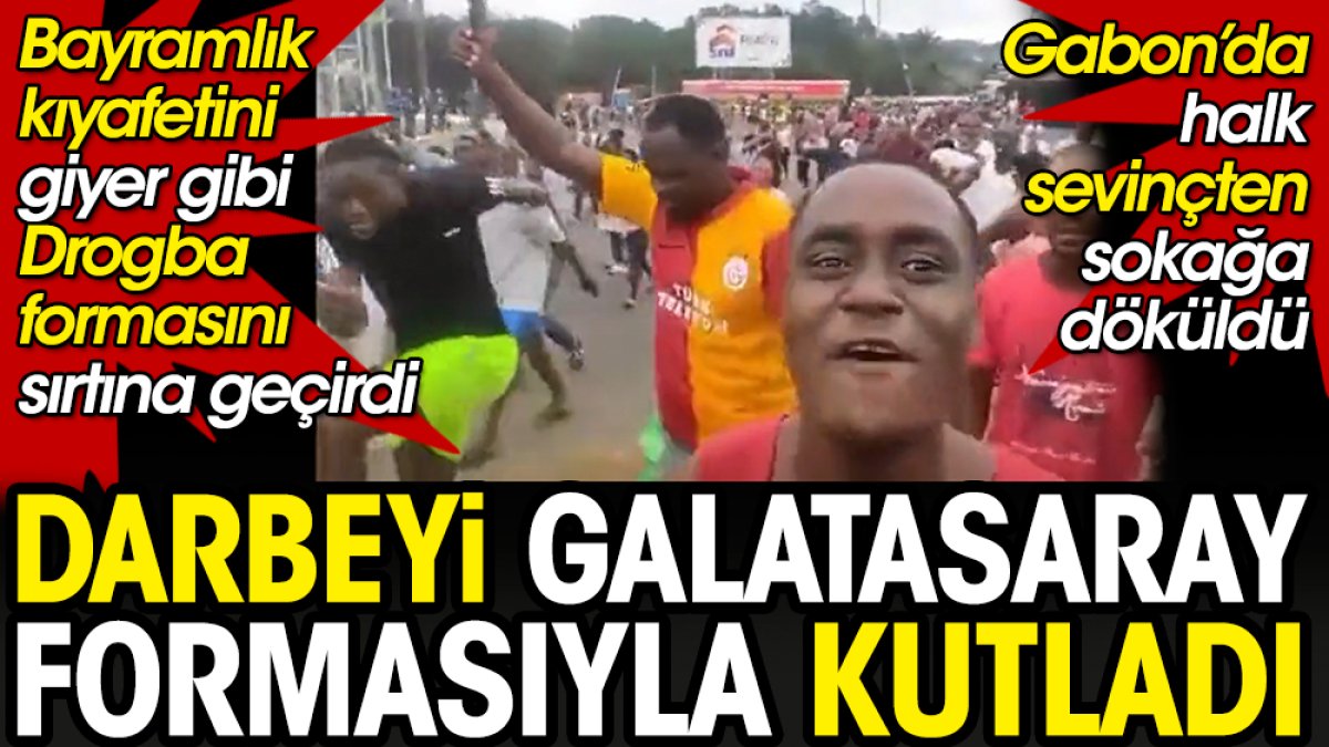Gabon'daki darbeyi Galatasaray formasıyla kutladı. Bayramlığını giyer gibi Drogba formasıyla sokağa çıktı