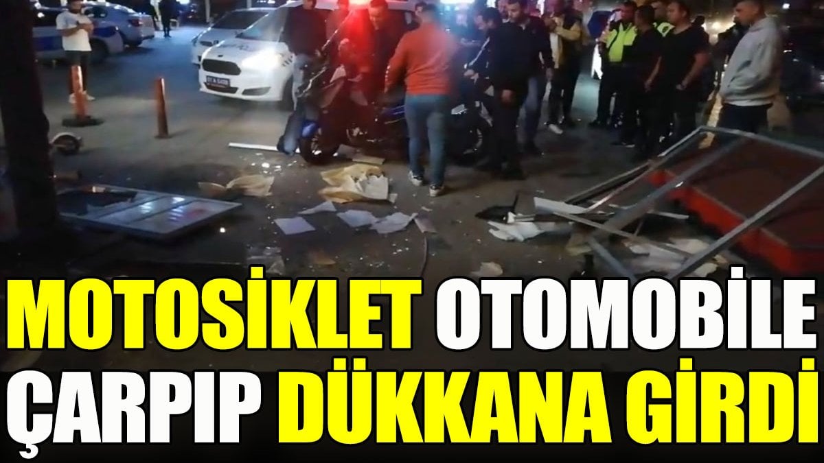 Motosiklet otomobile çarpıp dükkana girdi