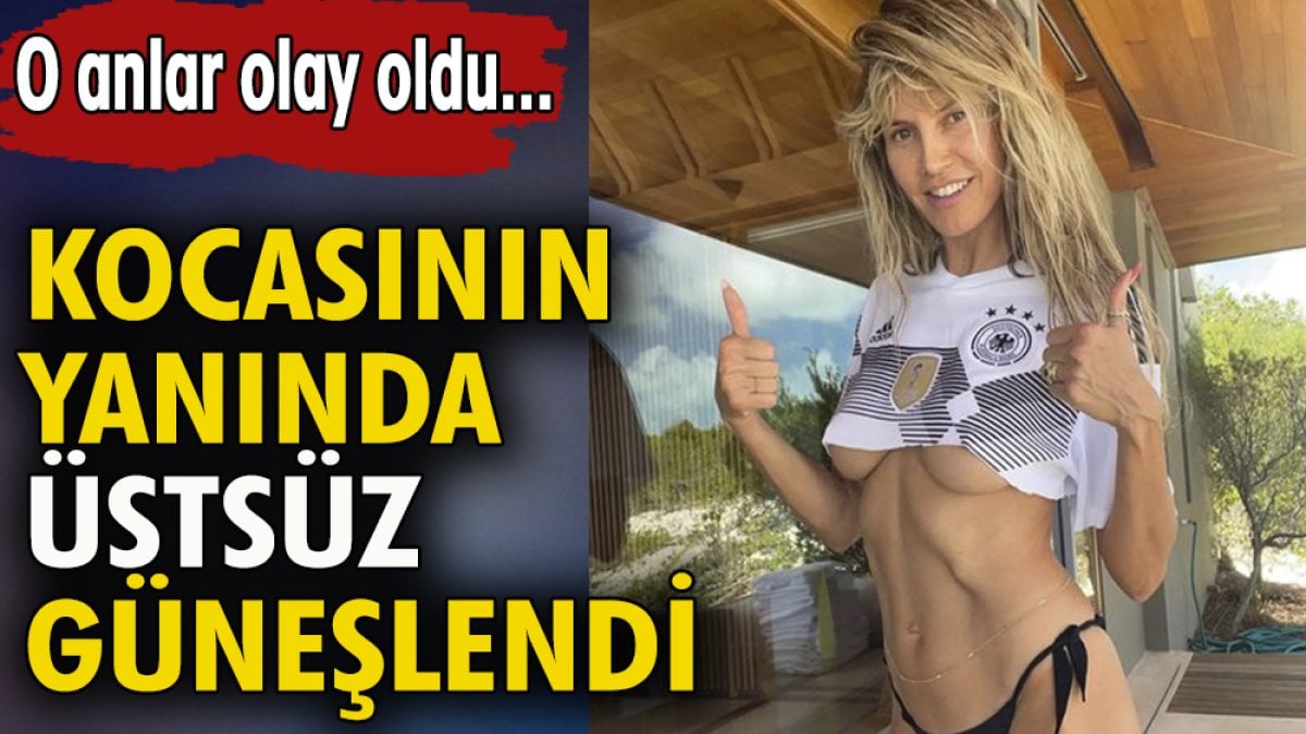 Kocasının yanında üstsüz güneşlendi. O anlar olay oldu