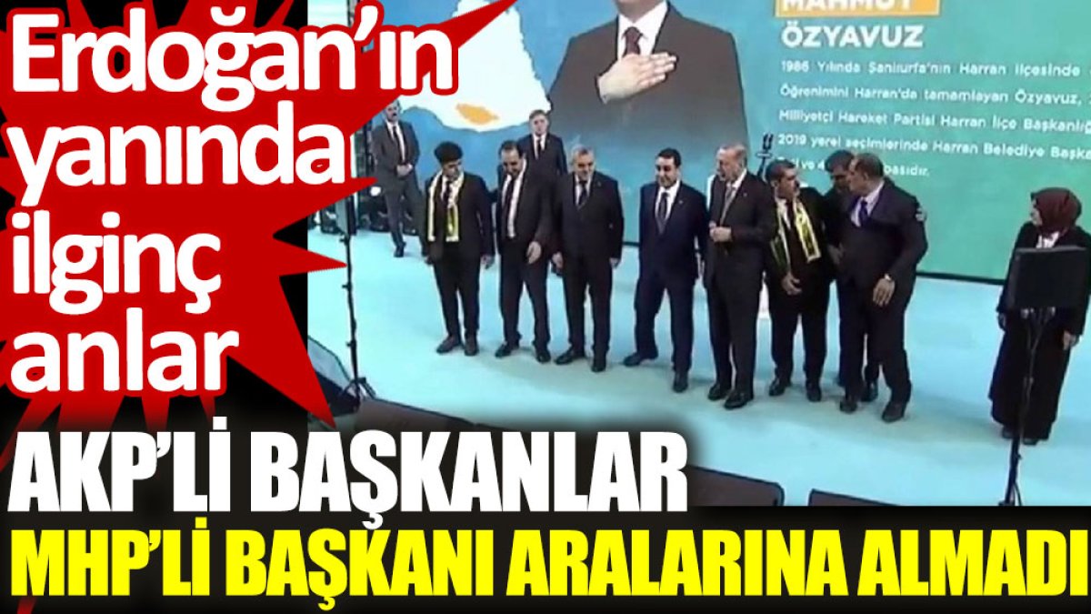 AKP’li başkanlar aday tanıtım töreninde MHP’li başkanı dışladı. Elini tutmadılar