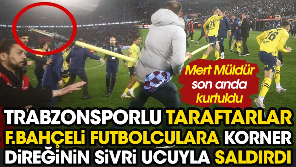 Trabzonsporlu taraftar Fenerbahçeli futbolculara korner direğinin sivri ucuyla saldırdı. Görenler dehşete kapıldı