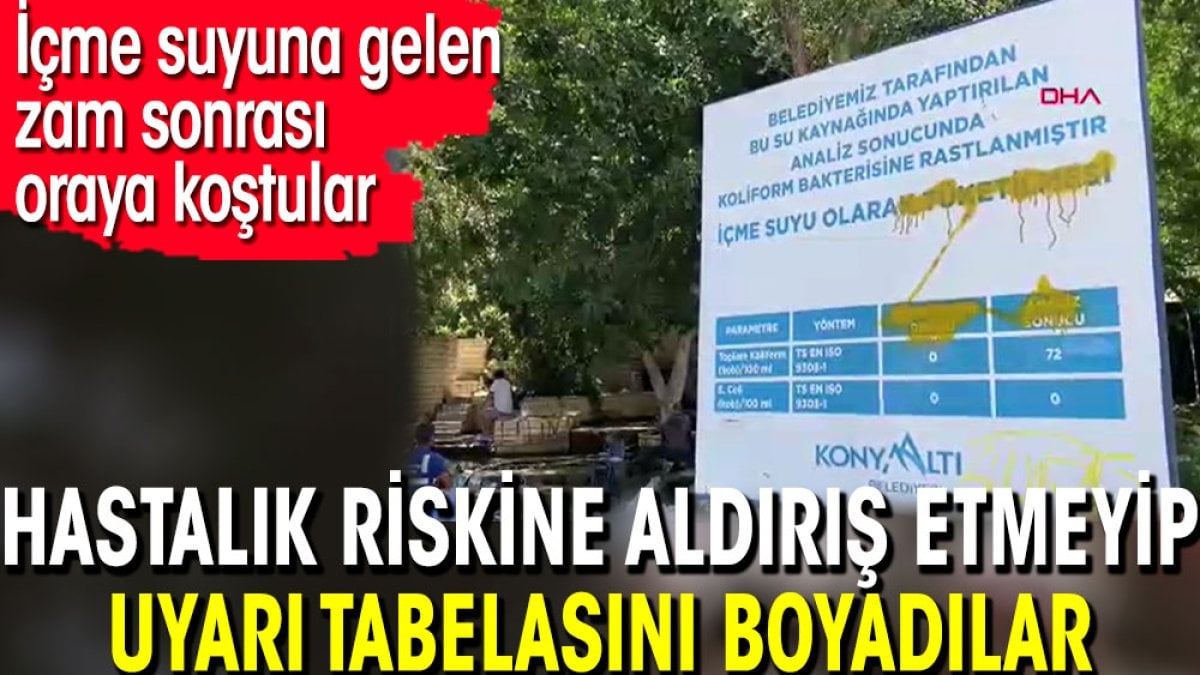 Hastalık riskine aldırış etmeyip uyarı tabelasını boyadılar. İçme suyuna gelen zam sonrası oraya koştular