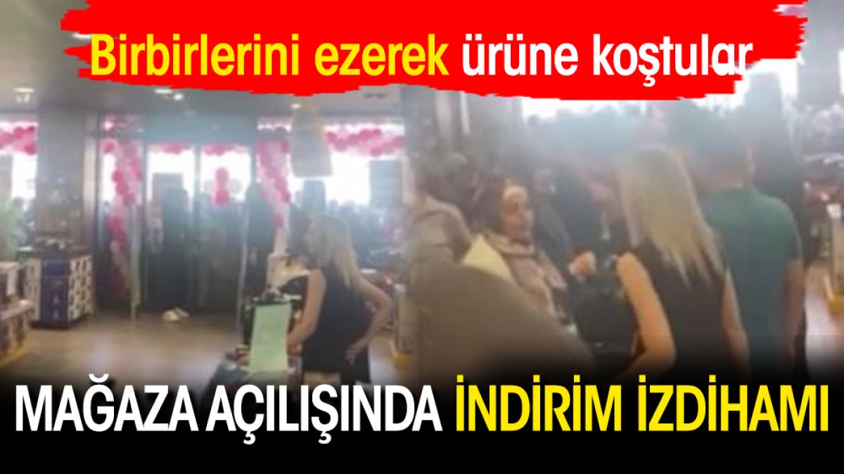 Mağaza açılışında indirim izdihamı! Birbirlerini ezerek ürüne koştular