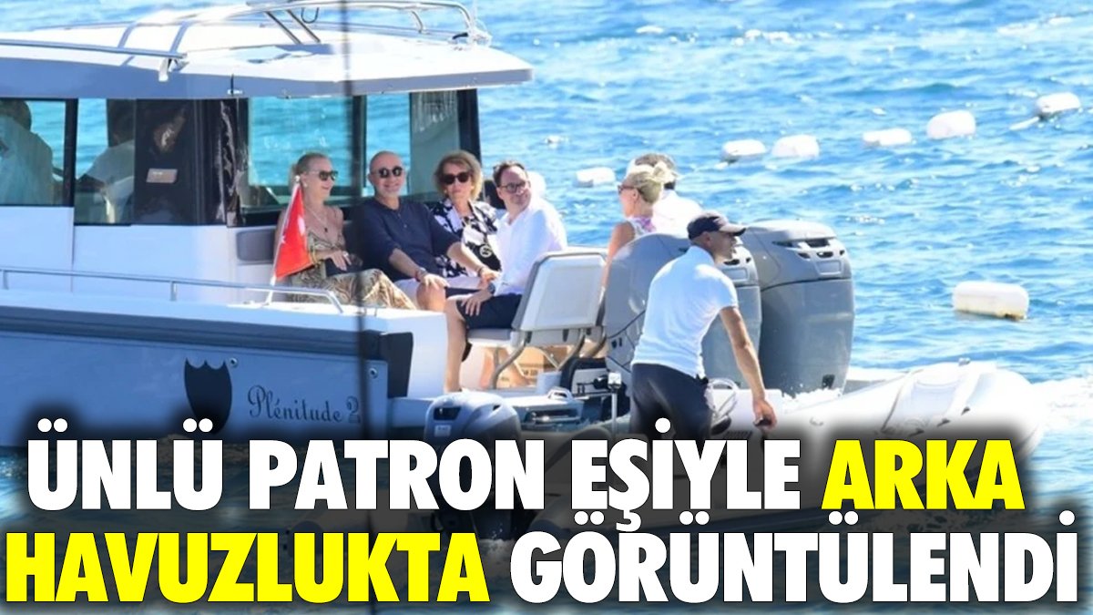 Ünlü patron eşiyle arka havuzlukta görüntülendi