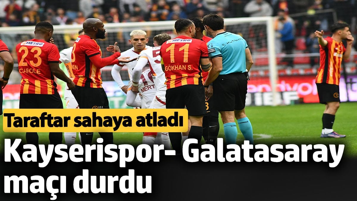 Kayserispor- Galatasaray maçı durdu. Taraftar sahaya atladı