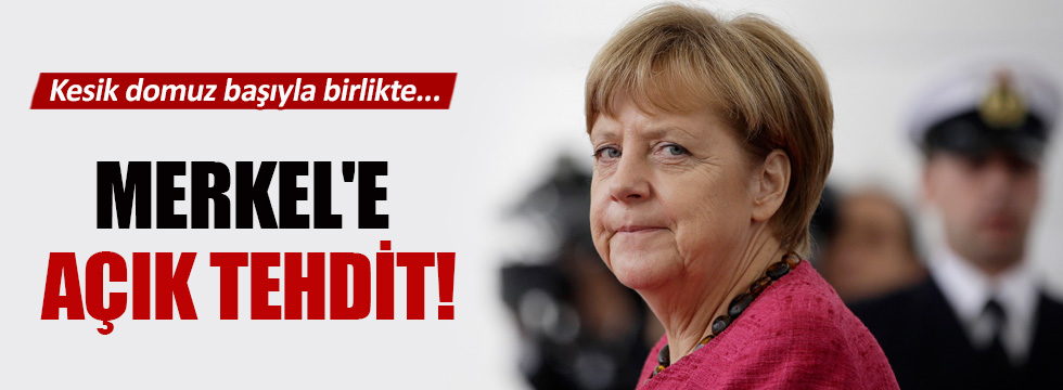 Angela Merkel'e kesik domuz başıyla tehdit