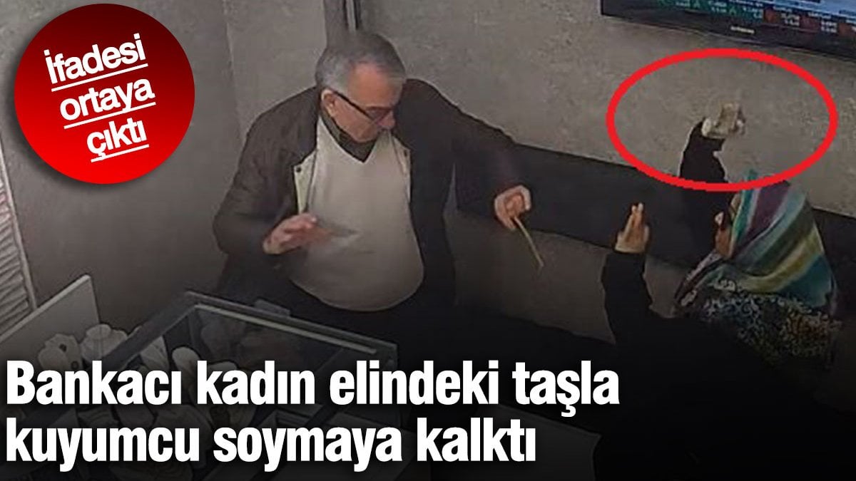 Bankacı kadın elindeki taşla kuyumcu soymaya kalktı