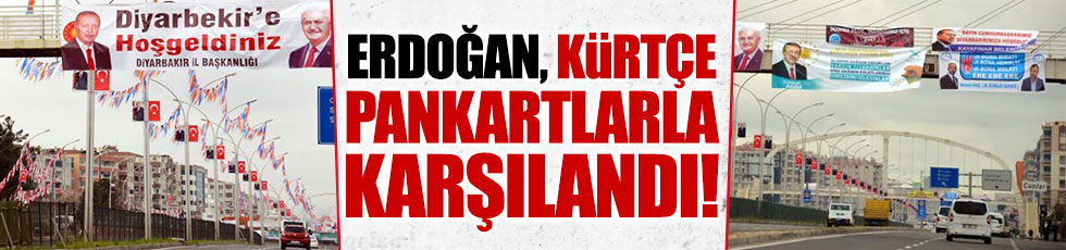 Erdoğan Diyarbakır'da Kürtçe pankartlarla karşılandı