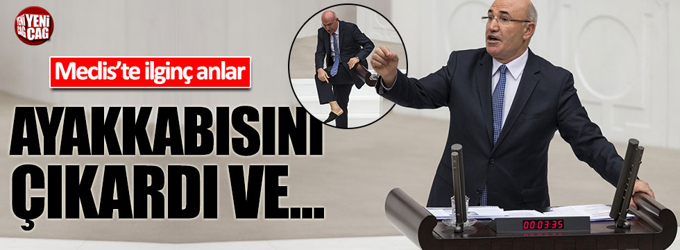 CHP'li Tanal Meclis'te ayakkabısını çıkararak protesto etti