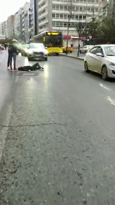 Şişli'de bayılan adama para verme yarışı - Resim : 2