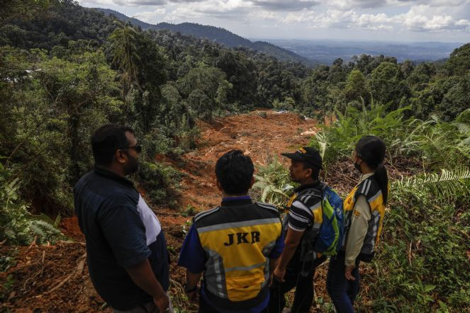 Malezya'da toprak kaymasında ölenlerin sayısı 31'e yükseldi - Resim : 3