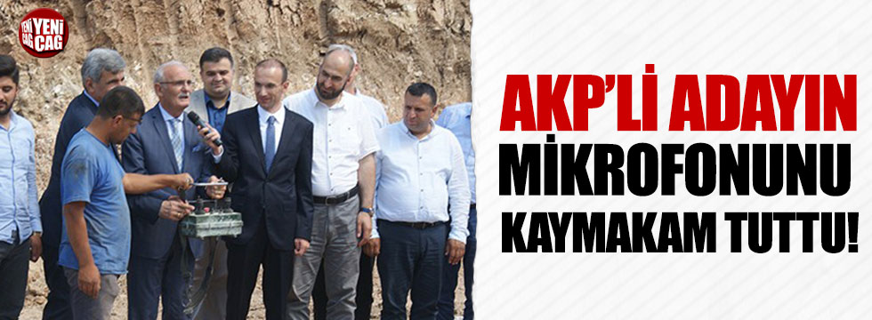 Kaymakam, AKP'li adayın mikrofonunu tuttu