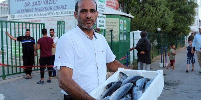 Hatay’da Suriyelilere balık yardımı