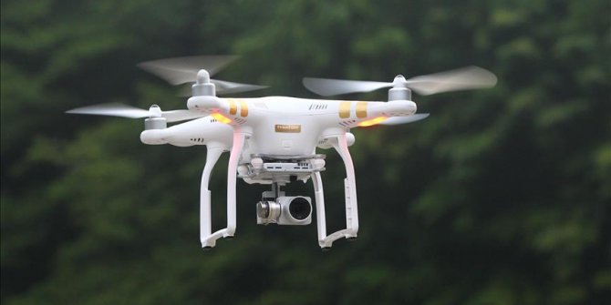 Kırmızı ışıkta geçen ehliyetsiz sürücü "drone"a yakalandı