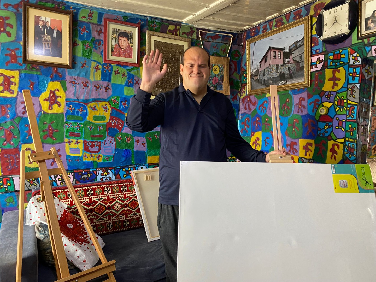 İYİ Partili Lütfü Türkkan'dan engelli ressam Muhammed Yalçın'a yardım