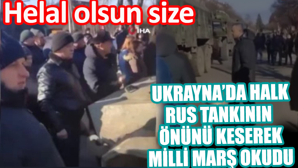 Rus tankının önünü kesen Ukrayna halkı milli marş okudu