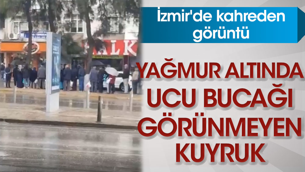 İzmir'de kahreden görüntü... Yağmur altında ucu bucağı görünmeyen kuyruk