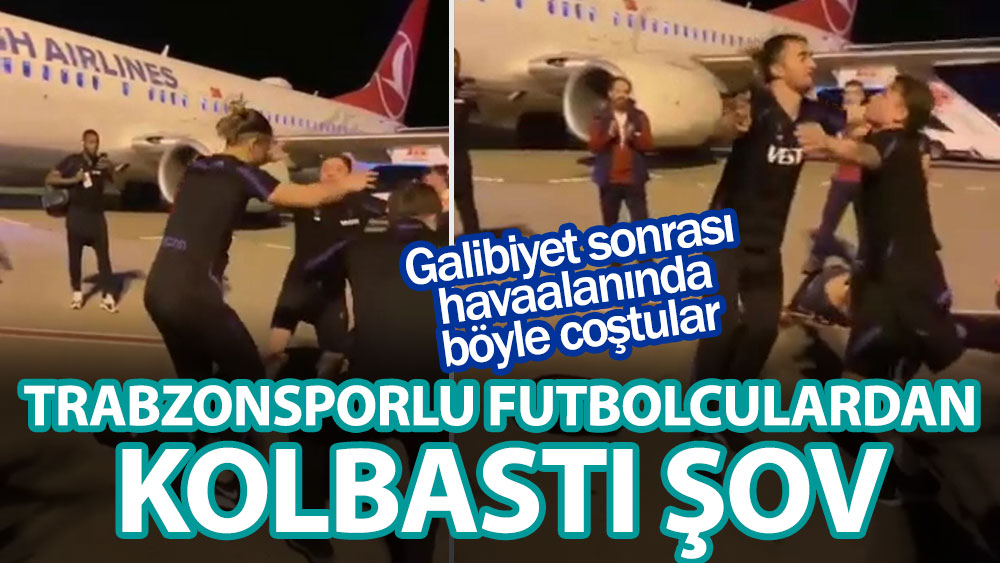 Trabzonsporlu futbolculardan havaalanında kolbastı şov! Galibiyet sonrası böyle coştular