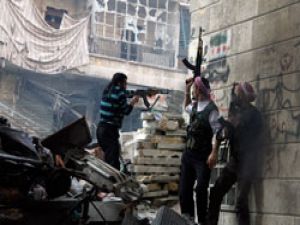 Esad güçleri Humus’u isyancılardan geri aldı