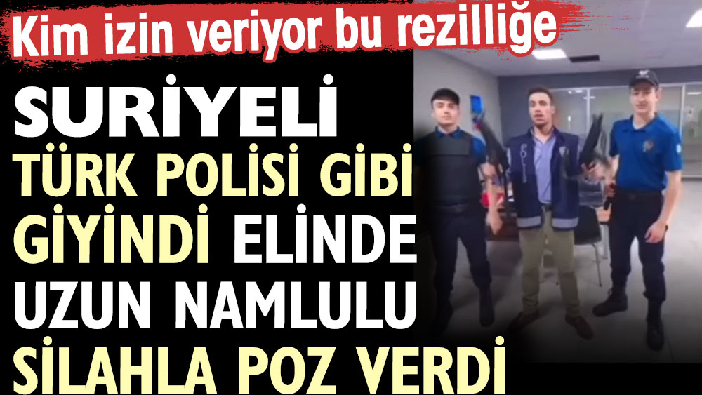 Suriyeli Türk polisi gibi giyindi elinde uzun namlulu silahla poz verdi. Kim izin veriyor bu rezilliğe