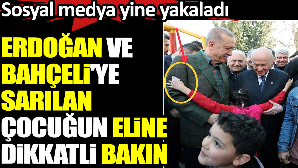 Deprem bölgesinde Erdoğan ve Bahçeli'ye sarılan çocuğun eline para vermişler. Sosyal medya yine yakaladı