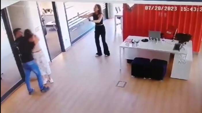 İş yerinde kadını rehin alan saldırgan kamerada
