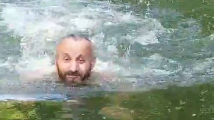Yüzmek için girdiği derede gencin boğulma anı kamerada