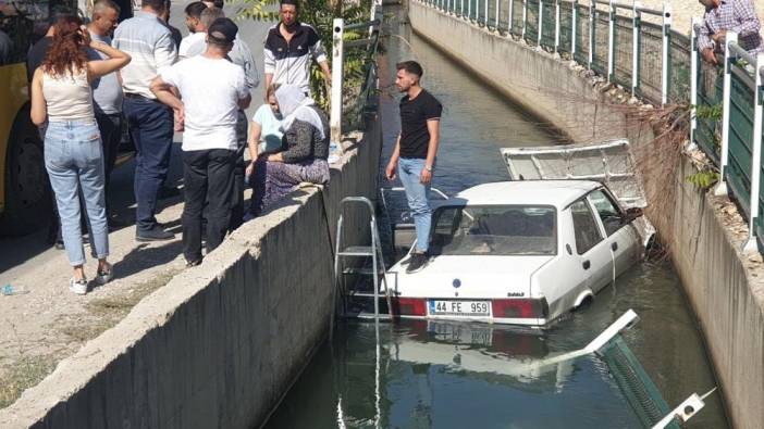 Araba sulama kanalına uçmuştu. 2 kişi güçlükle kurtarıldı