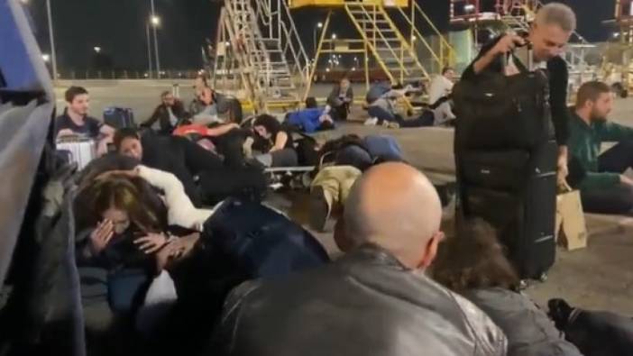 Ülkeden kaçmak için havalimanına akın eden İsrailliler, füze saldırısına yakalandı