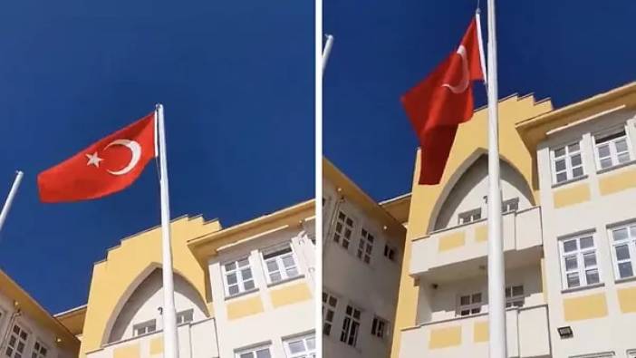 İki genç milli yas için yarıya indirilen Türk Bayrağı'nı yeniden göndere çekti