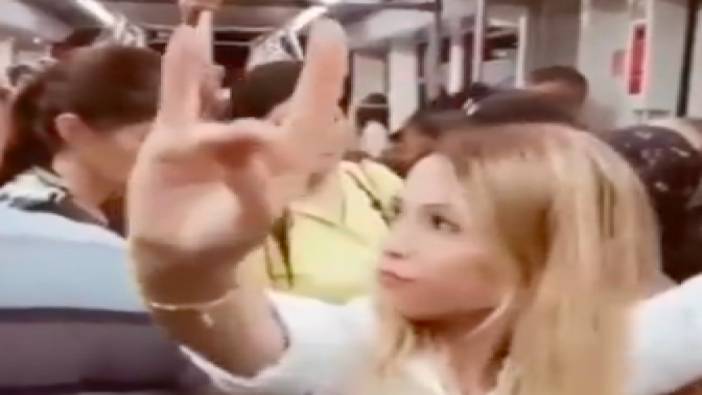 Metroda Bozkurt işareti yapan kadın kendisine tepki verilince: "Zorunuza mı gidiyor?"