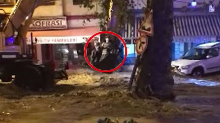 Bursa'da sel baskınında iş yerinde mahsur kalan kadın kepçe ile kurtarıldı