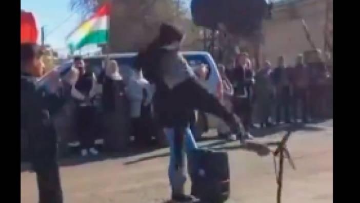 Mardin'de bir vatandaştan Kürdistan bayrağına uçan tekmeli tepki
