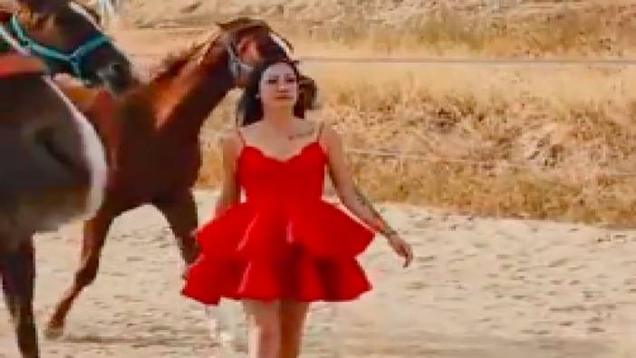 Atların koştuğu alanda fotoğraf çekimi yapan modele at çarptı