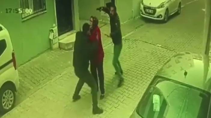 Silahlı kavgada sokaktan geçen kadını kalkan olarak kullandı