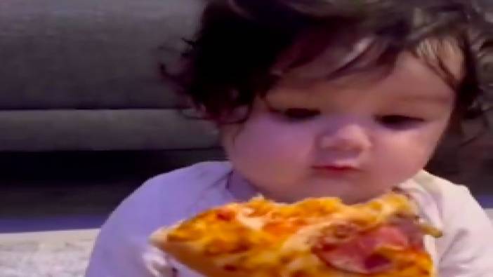 Küçük kızın babasıyla pizza keyfi izleyenlerin yüreğini ısıttı