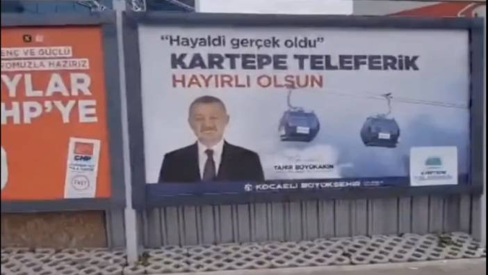 İzmir'de Kocaeli Büyükşehir Belediyesi Başkan adayının reklam afişleri asılması görenleri şaşırttı