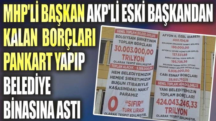 MHP'li başkan AKP'li eski başkandan kalan borçları pankart yapıp belediye binasına astı