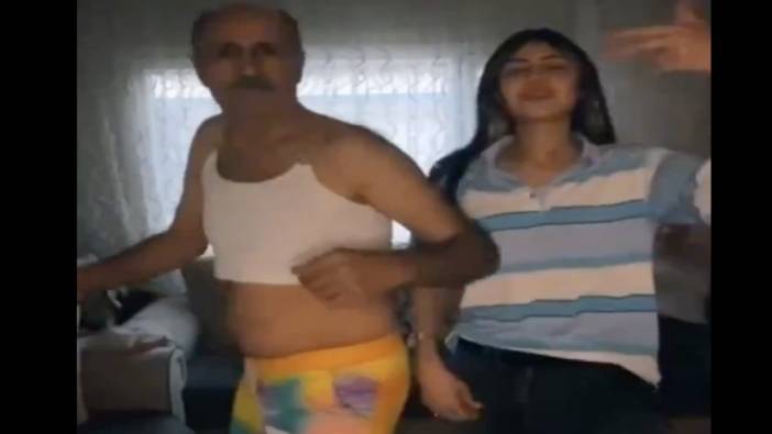 Kızıyla video çeken baba kızının kıyafetlerini giyince tepki topladı