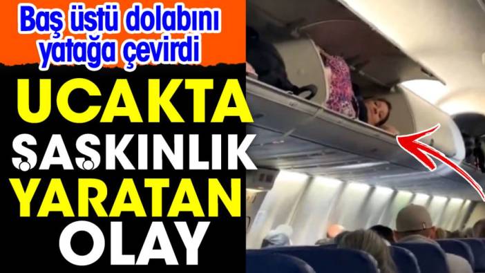 Uçakta şaşkınlık yaratan olay. Baş üstü dolabını yatağa çevirdi