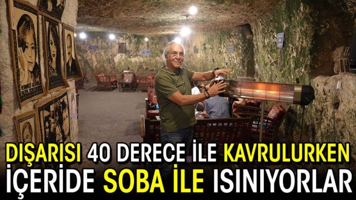 Dışarısı 40 derece ile kavrulurken içeride soba ile ısınıyorlar