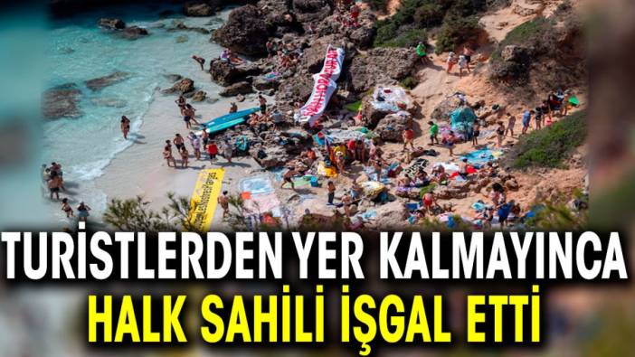 Turistlerden yer kalmayınca halk sahili işgal etti