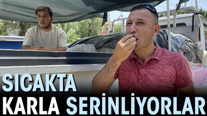 Sıcakta karla serinliyorlar