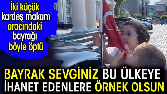 Bayrak sevginiz bü ülkeye ihanet edenlere örnek olsun. İki küçük kardeş makam aracındaki bayrağı böyle öptü