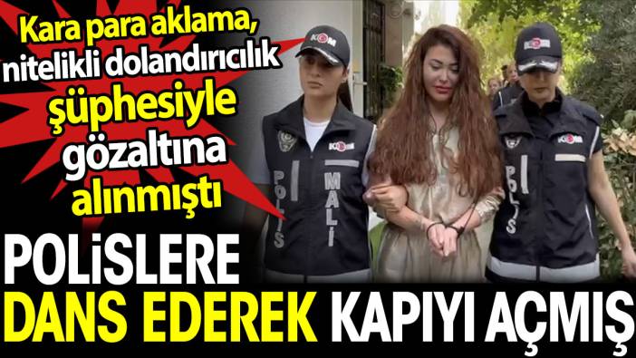 Neslim Güngen polislere dans ederek kapıyı açmış. Kara para aklama, nitelikli dolandırıcılık şüphesiyle gözaltına alınmıştı