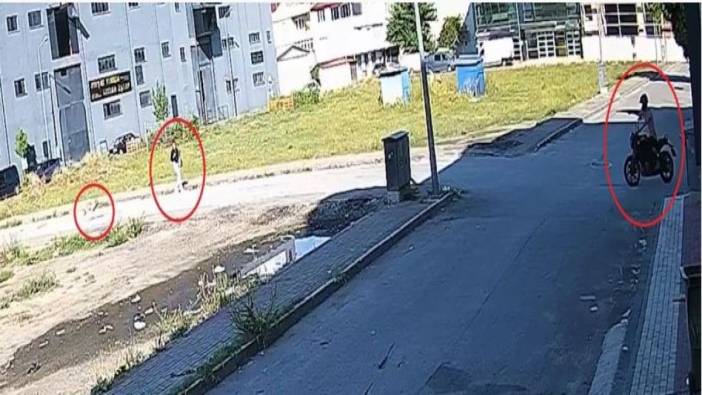 Kadına saldıracak köpeği motosikletiyle engelledi. Gözüne kestirmişti