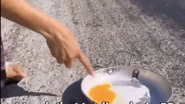 Mersin'deki sıcaklığı göstermek için asfaltta yumurta pişirdi