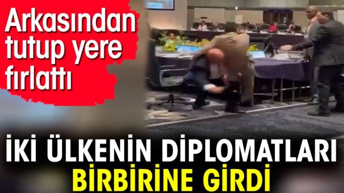 İki ülkenin diplomatları birbirine girdi. Arkasından tutup yere fırlattı